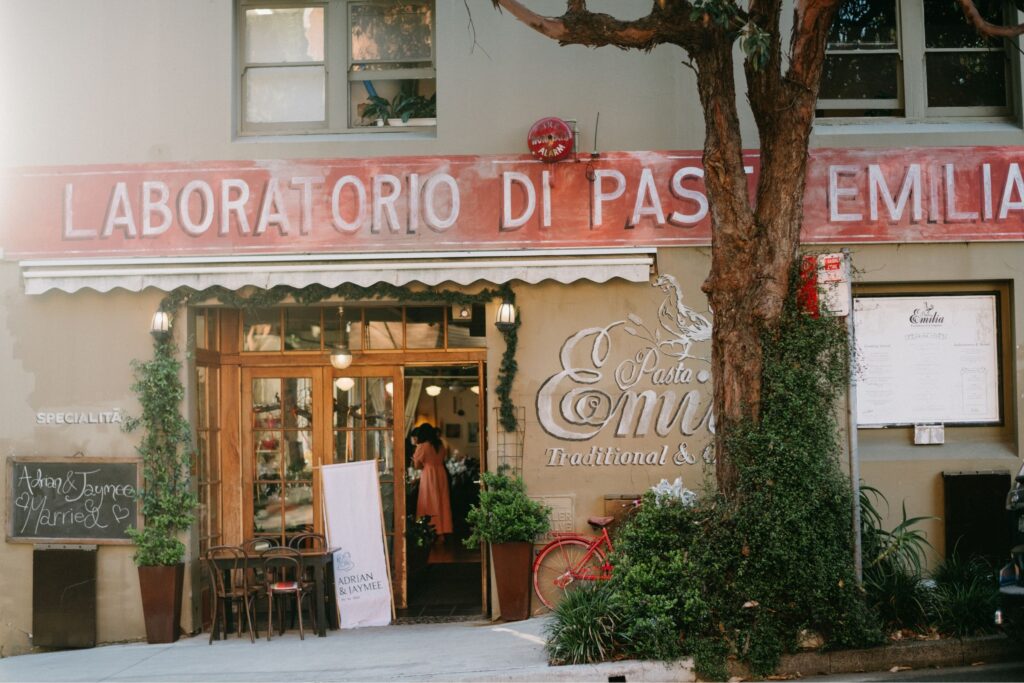 Exterior of Laboratorio di Pasta Emilia restaurant in Surry Hills with ivy-covered shopfront — intimate restaurant wedding venue in Sydney photographed by Tealily Photography

