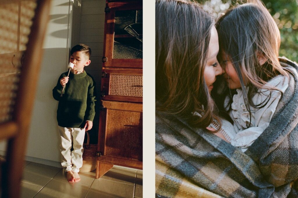 an image of a boy eating a marshmallow and a girl with her mum cosy in a winter blanket